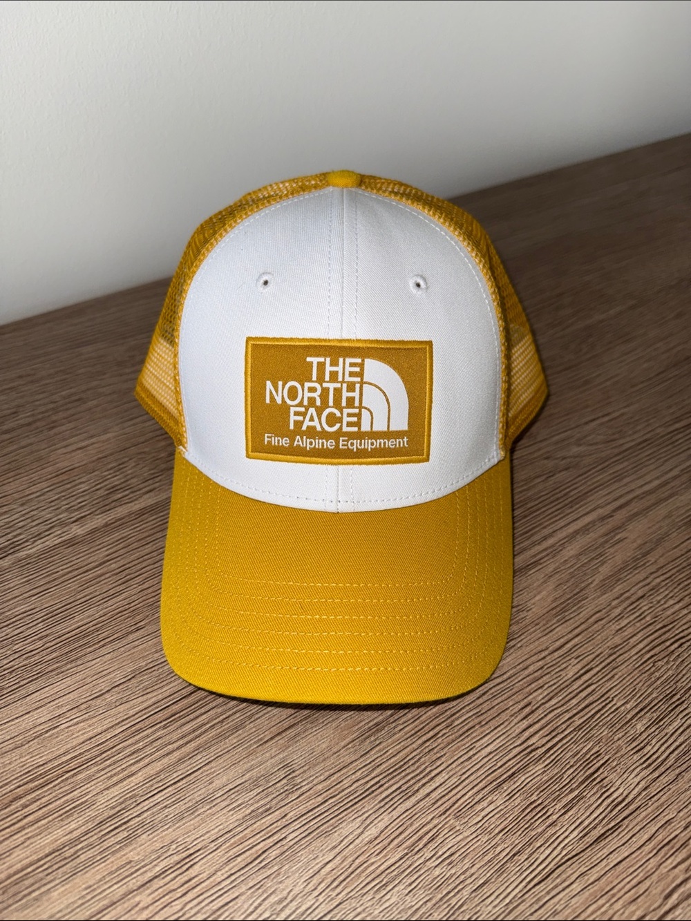 The North Face White & Yellow Logo Trucker Cap